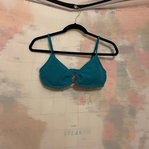 Roxy teal bikini top. Padded. Never worn. No damage
